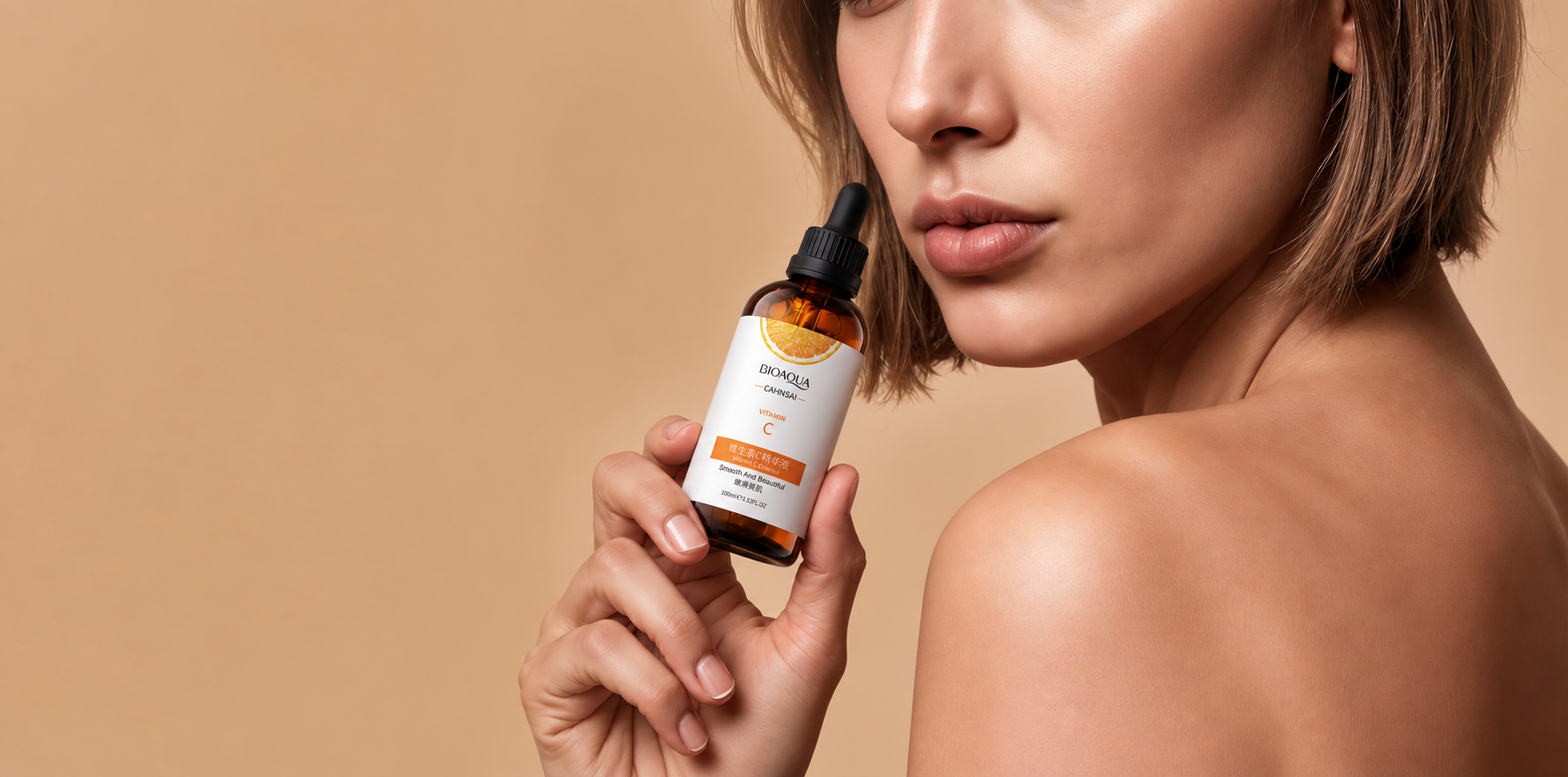 BIOAQUA Vitamin C serum held by a model against a warm peach background
